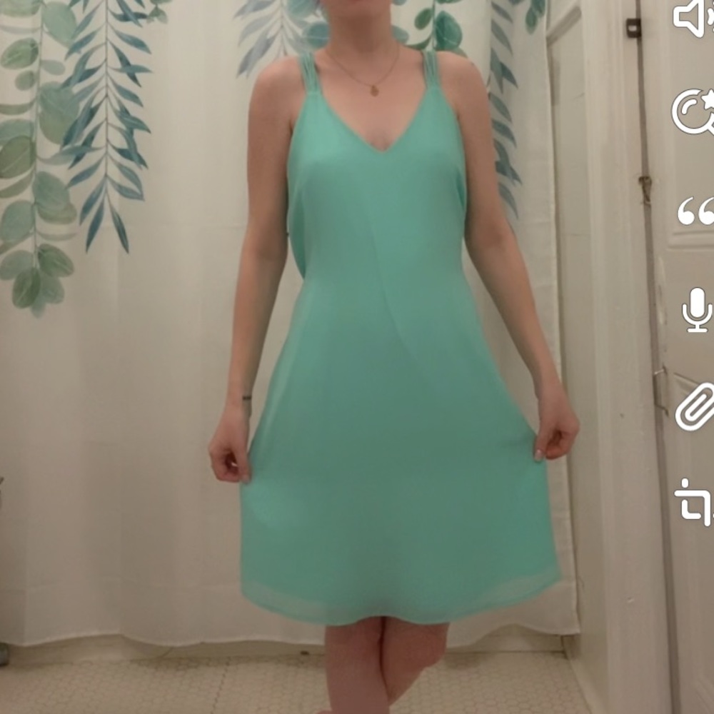 Mint green light and flowy dress
